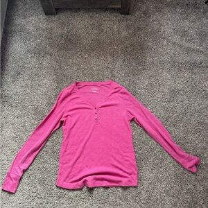Pink in color, large long sleeve shirt
